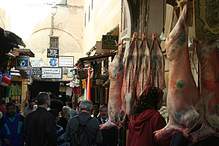 A butcher's shop with hanging camel head!